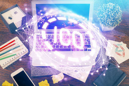 Double exposure of blockchain theme hologram and table with computer background. Concept of bitcoin...