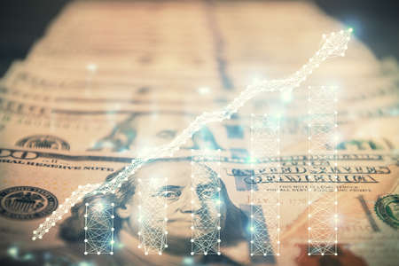 Double exposure of forex graph drawing over us dollars bill background. Concept of financial markets.の写真素材