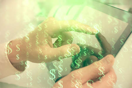 Multi exposure of man's hands holding and using a phone and financial chart drawing. Market analysis...