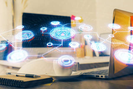 Computer on desktop with social network hologram. Multi exposure. Concept of international people...