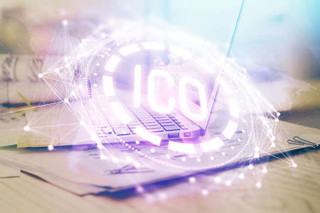 Double exposure of blockchain theme hologram and table with computer background. Concept of bitcoin...