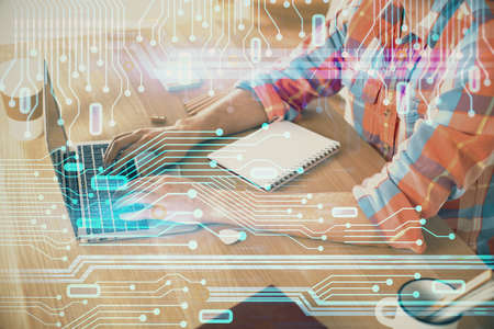 Businessman with computer background with technology theme hologram. Concept of big data. Double...