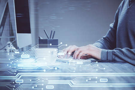 Double exposure of tech drawings with hands working on computer background. Concept of innovation.