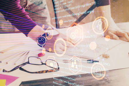 Writing man with technology icons. . Double exposure. Network and data concept.