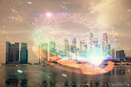 Data theme hologram drawing on city view with skyscrapers background multi exposure. Bigdata...