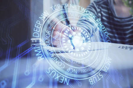Double exposure of hands making notes with digital coding icons. Computer learning concept.