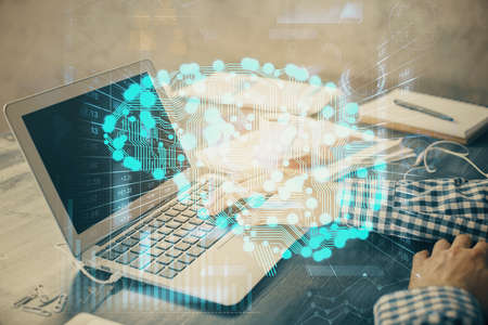Man typing on keyboard background with brain hologram. Concept of big Data.