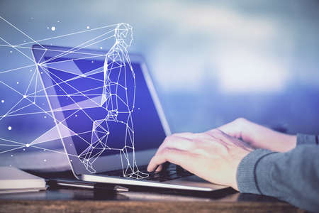Start up drawings with businessman working on computer on background. Teamwork concept. Double...
