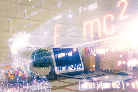 Desktop computer background and formula hologram writing. Double exposure. Education concept.