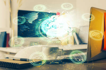 Computer on desktop with social network hologram. Multi exposure. Concept of international people...
