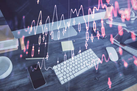 Multi exposure of forex graph and work space with computer. Concept of international online trading.の写真素材