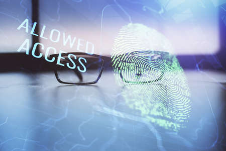 Fingerprint drawing with glasses on the table background. Concept of security. Double exposure.