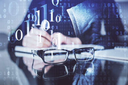 Double exposure of writing hands on background with data solution hologram on front. Technology...