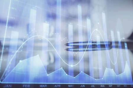 Double exposure of forex chart over coffee cup background in office. Concept of financial analysis...