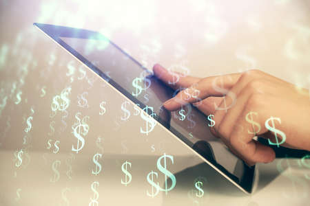 Multi exposure of mans hands holding and using a digital phone and forex graph drawing. Financial market concept.の写真素材