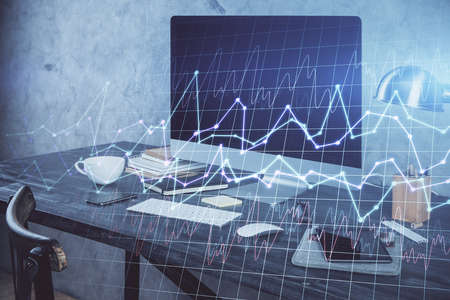 Multi exposure of graph and financial info and work space with computer background. Concept of international online trading.の写真素材