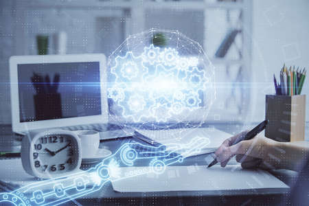 Multi exposure of woman hands on background with technology coding hologram. Data concept.