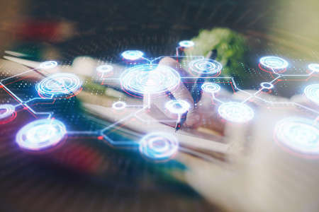 Social network theme hologram over womans hands writing background. Concept of international people...