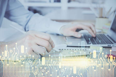 A man working on computer with technology theme drawing. Concept of big data. Multi exposure.
