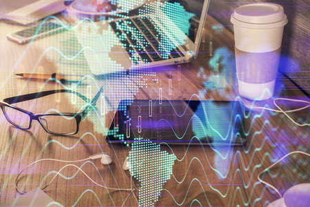 Double exposure of forex chart drawing and cell phone background. Concept of financial trading