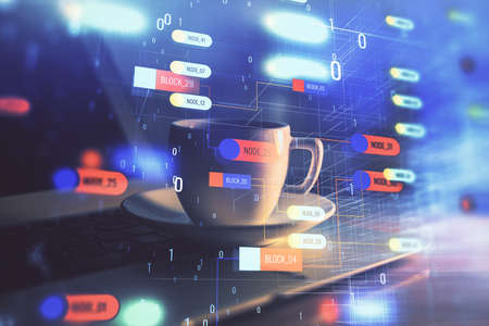 Double exposure of desktop computer and technology theme hologram. Concept of software development.