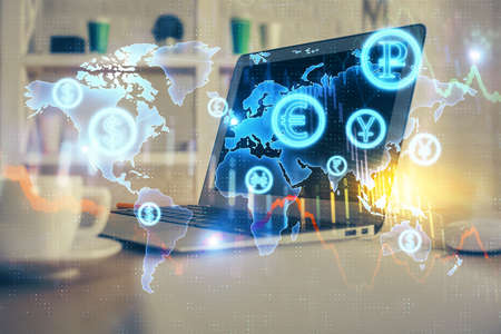 Double exposure of forex graph and work space with computer. Concept of international online...