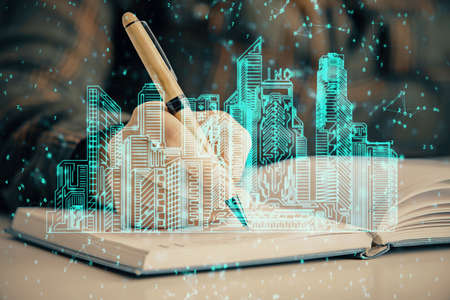 IOT drawing over writing hands in notepad background. Concept of smaert home. Multi exposure