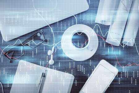 Multi exposure of forex graph drawing over desktop background with computer. Concept of financial...