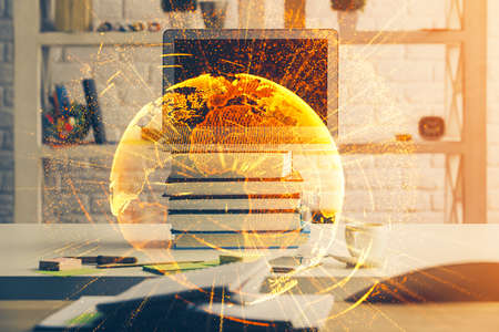 Computer on desktop with social network hologram. Multi exposure. Concept of international people connections.の写真素材