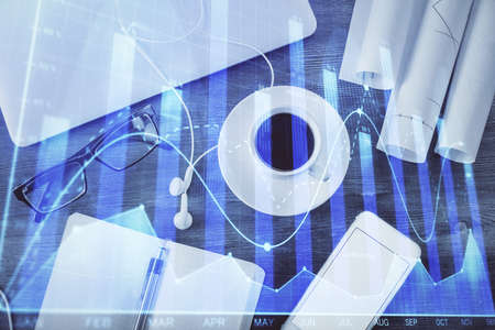 Multi exposure of forex graph drawing over desktop background with computer. Concept of financial...