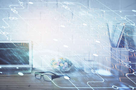Double exposure of desktop with personal computer on background and tech theme drawing. Concept of...