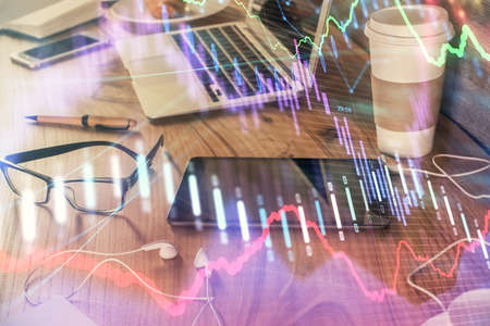 Double exposure of forex chart drawing and cell phone background. Concept of financial trading