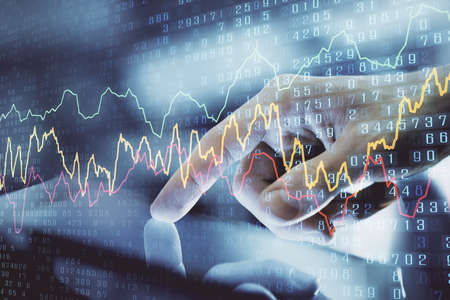 Multi exposure of mans hands holding and using a digital phone and forex graph drawing. Financial...