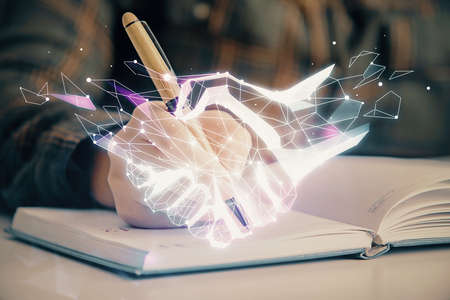 Handshake drawing over hands taking notes background. Concept of success. Double exposureの写真素材