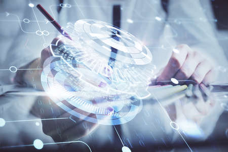 Multi exposure of womans writing hand on background with data technology hud. Big data concept.