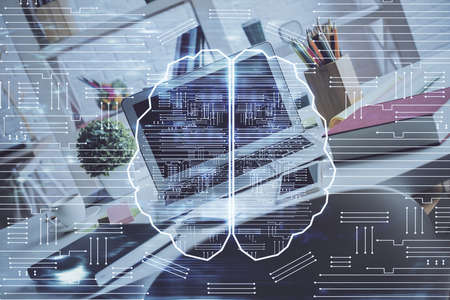 Double exposure of work space with computer and human brain drawing hologram. Brainstorm concept.
