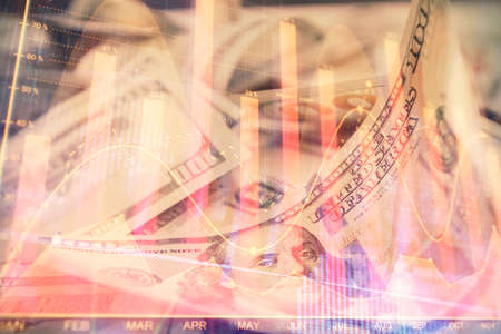 Double exposure of forex graph drawing over us dollars bill background. Concept of financial markets.の写真素材