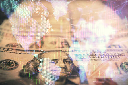 Double exposure of forex graph drawing over us dollars bill background. Concept of financial markets.の写真素材