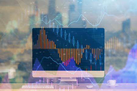 Forex market chart hologram and personal computer background. Multi exposure. Concept of investment.