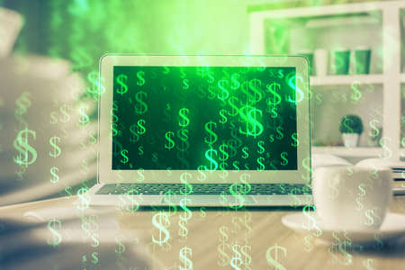 Forex market chart hologram and personal computer background. Double exposure. Concept of...