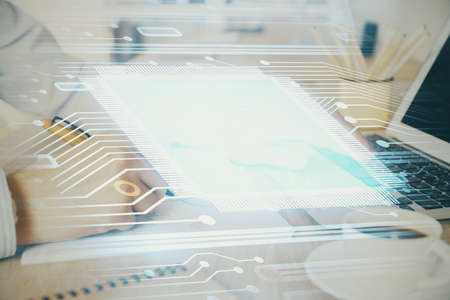 Businessman working on Laptop with technology theme drawing. Concept of big data. Double exposure.の写真素材
