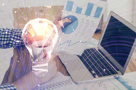 Growing arrows with businessman working on computer on background. Success concept. Double exposure.