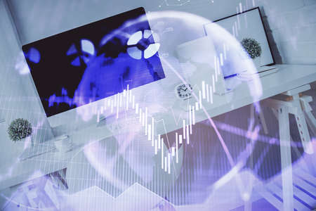 Double exposure of financial graph drawing and office interior background. Concept of stock market.の写真素材