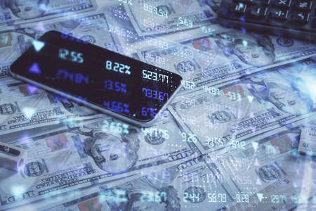 Double exposure of forex graph drawing over us dollars bill background. Concept of financial markets.の写真素材