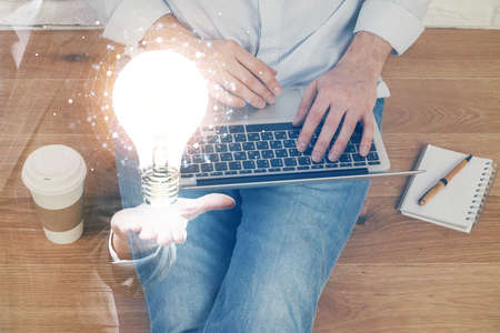 Growing arrows with businessman working on computer on background. Success concept. Double exposure.の写真素材