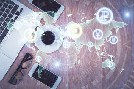 Multi exposure of financial chart hologram over desktop with phone. Top view. Mobile trade platform...