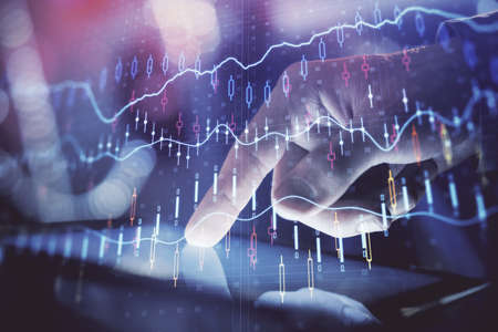 Multi exposure of mans hands holding and using a phone and financial chart drawing. Market analysis...