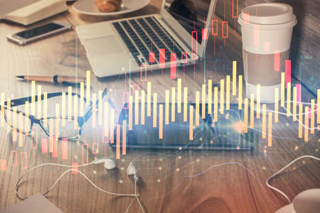 Double exposure of forex chart drawing and cell phone background. Concept of financial trading
