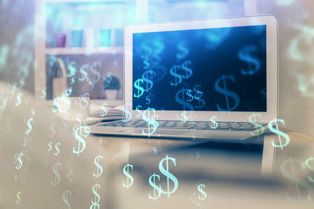Stock market chart hologram drawn on personal computer background. Double exposure. Concept of investment.の写真素材