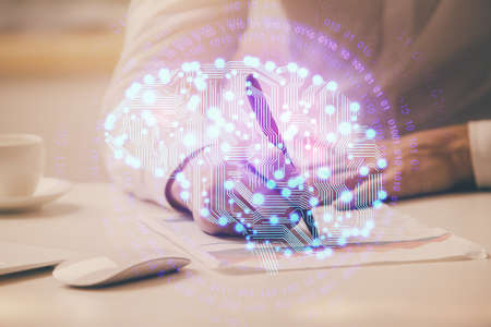 Mans hands withbrain double exposure drawing. Concept of human learning.の写真素材